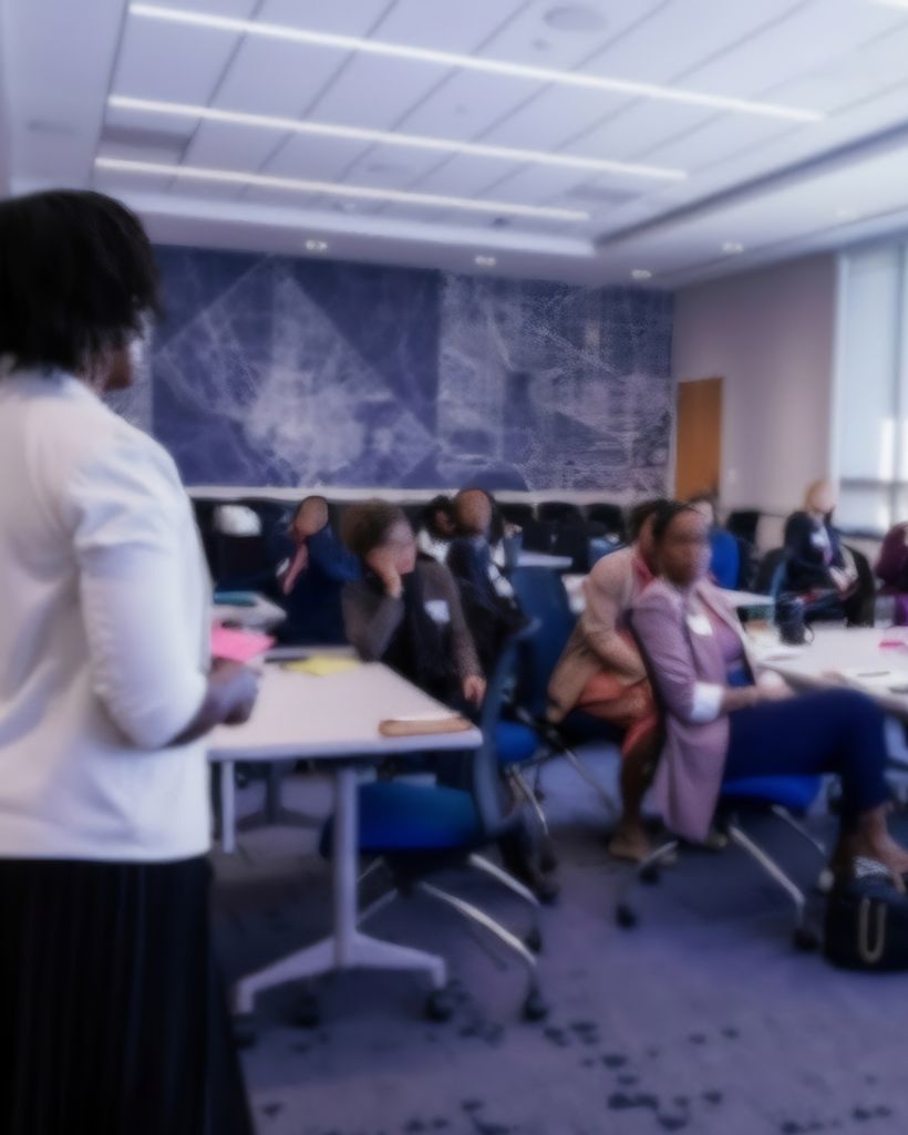 Christina facilitating a room of participants