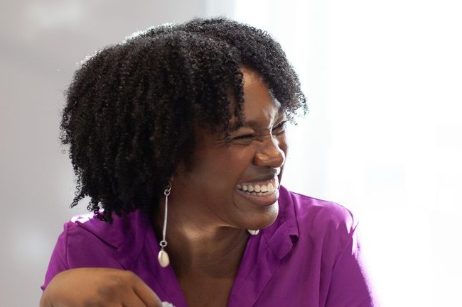 Christina in conversation with a client